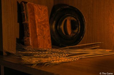 the-game-the-kidnapping-book-and-ear-of-wheat